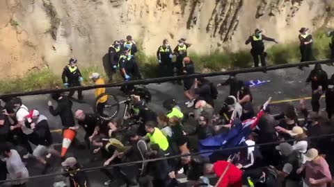 Protesters broke through the police line in Melbourne.