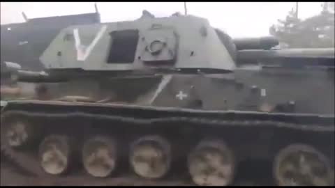 A Ukrainian MT-LB Tank Pulling A Captured Russian 2S3 "Akatsiya" and MT-LB Tanks.