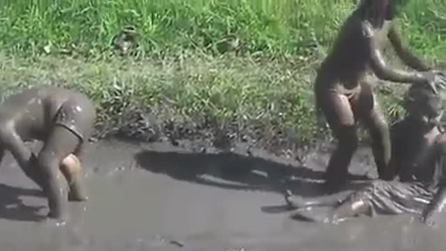 Kids having fun in a puddle - funny video