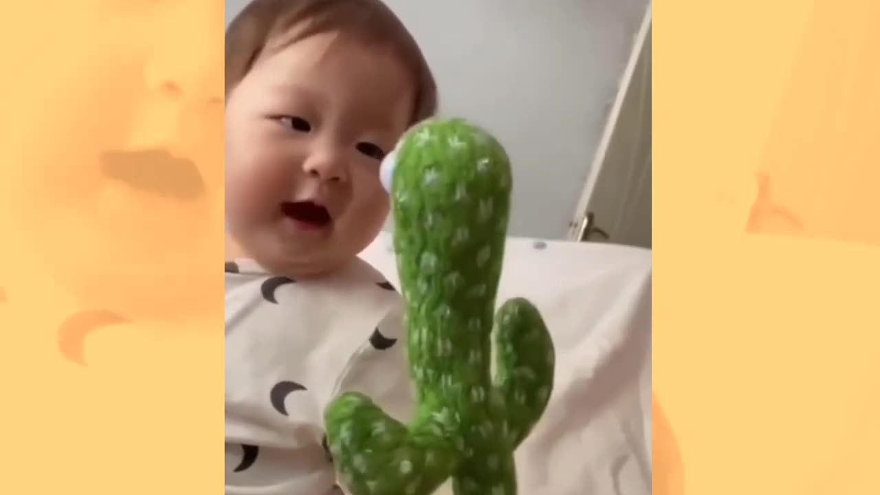 A toddler talking with his cactus friend 🤣