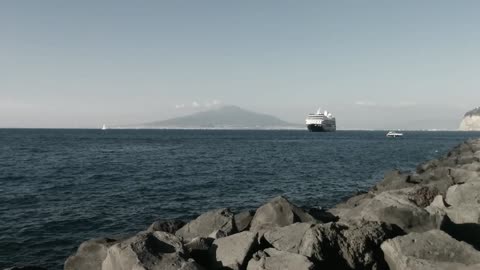 The cruise ship is parked in the water