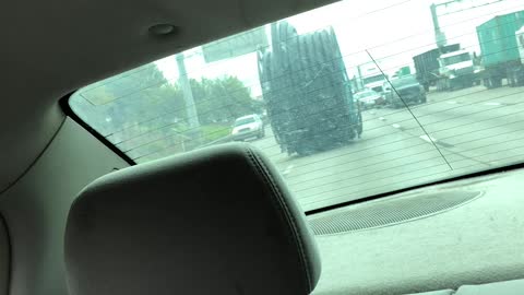 Giant Spool Falls off Truck, Rolls down Highway