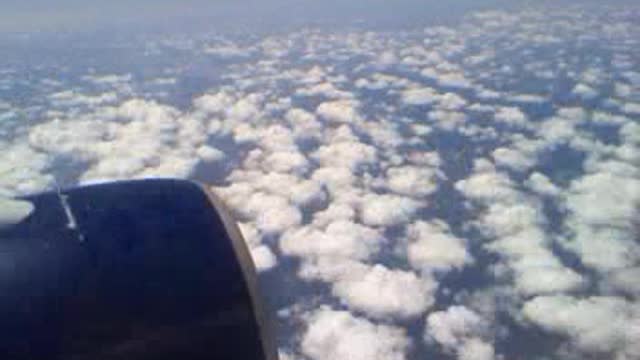 Flying Over The Clouds