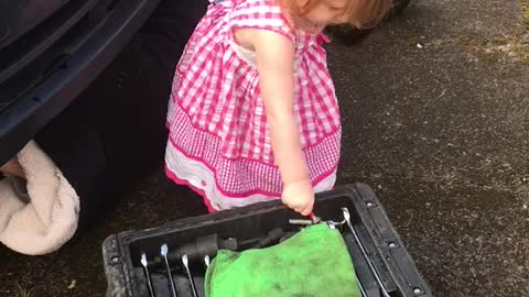 Daughter Helps Daddy With Car Maintenance