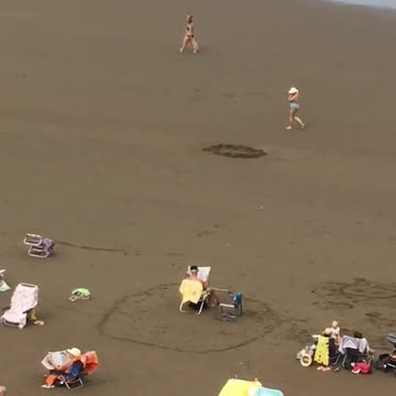 Man in chair with circle drawn around