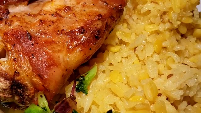 Grilled chicken with yellow rice and stir fry veggies