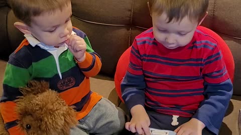 Josiah reading the Bible to his brother