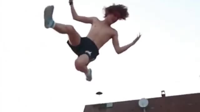 Boy showing his amazing trampoline skills