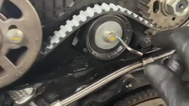 Automobile belt adjustment repair engine