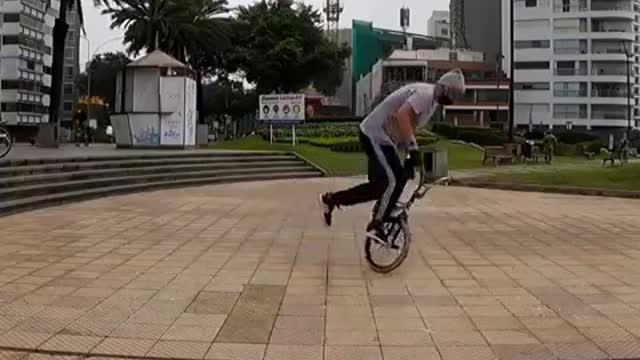 Man Performs Tricks With Bicycle