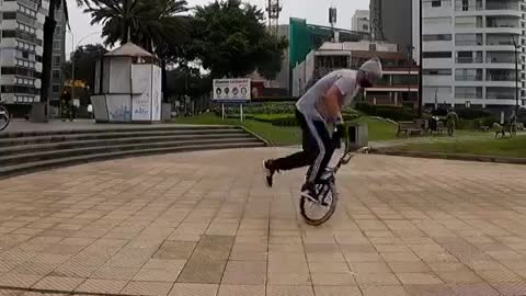 Man Performs Tricks With Bicycle