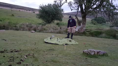 Putting up a lightweight trekking pole tent. DARTMOOR