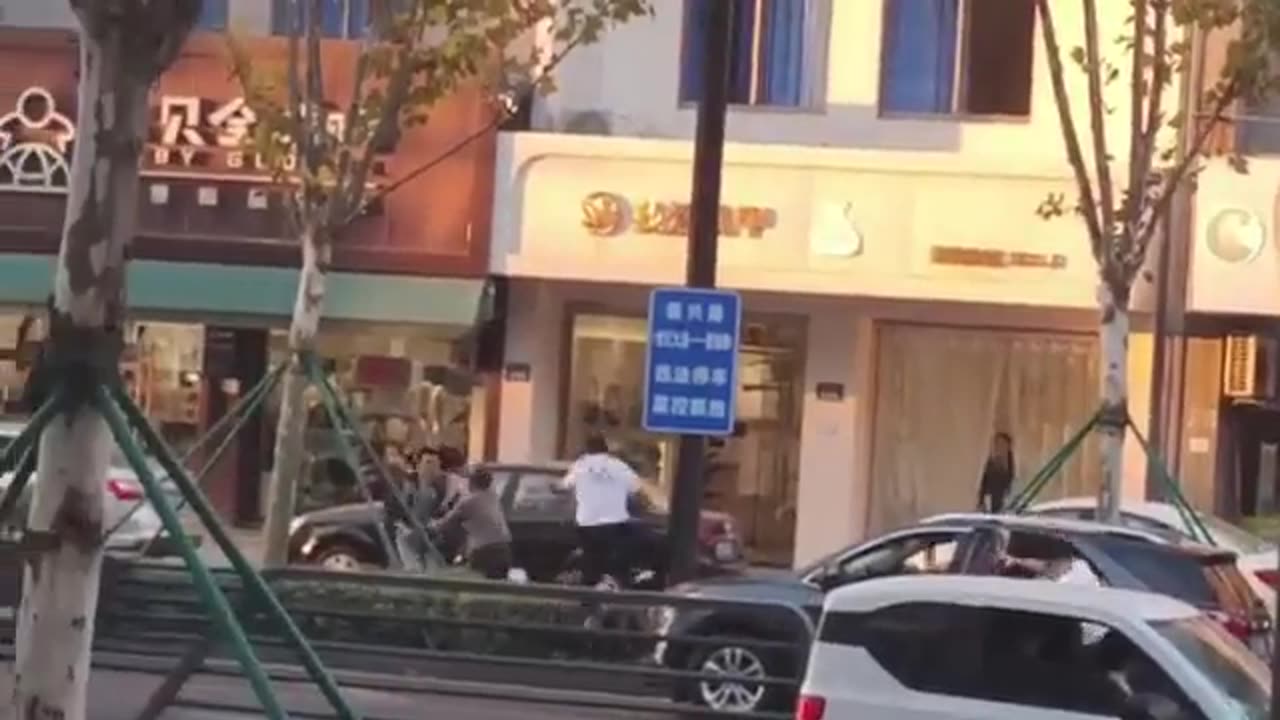 Hitting a female lawyer with a hammer in a downtown area