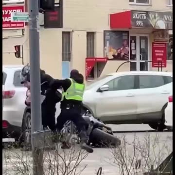 Ukrainian recruitment officers "invite" a "volunteer" to join the rest of the gang