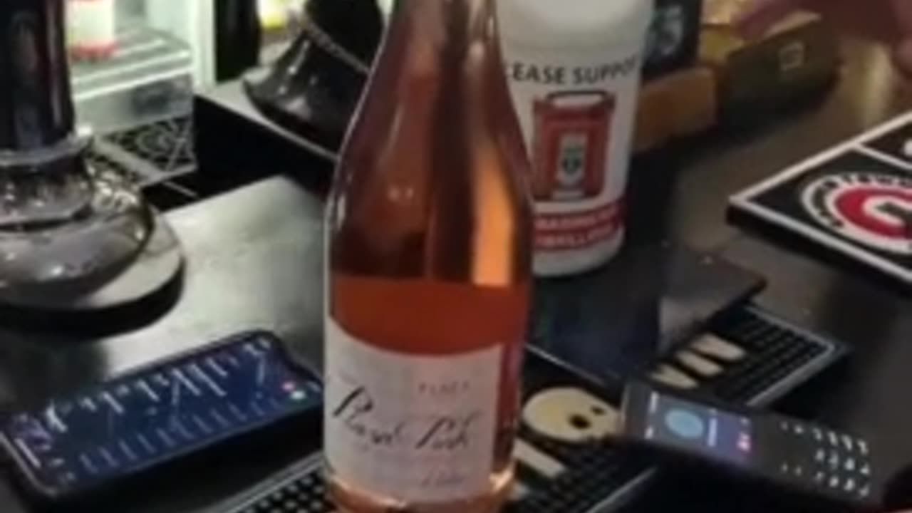 Radiation Generated by 2 Standard-Issue Smartphones is Enough to Heat and Pop a Bottle of Champagne