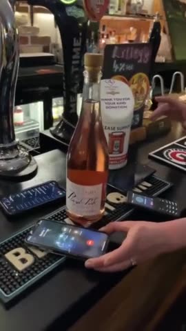 Radiation Generated by 2 Standard-Issue Smartphones is Enough to Heat and Pop a Bottle of Champagne