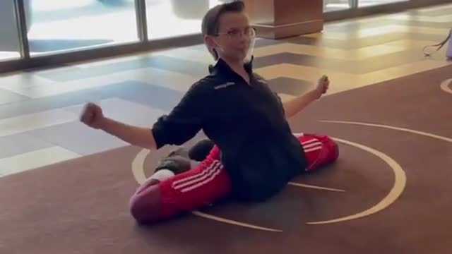 Person Shows Impressive Flexibility Skills By Sitting Up And Down Without Using Any Hands