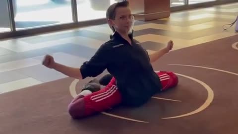 Person Shows Impressive Flexibility Skills By Sitting Up And Down Without Using Any Hands
