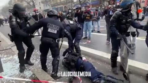 Paris, France - Oops, a cop is down