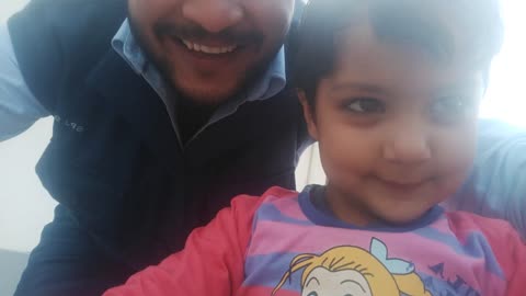 Baby girl enjoy with her birthday gift