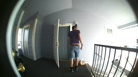 Angry Guy Kicks and Rips Doorbell Then Unlocks His Door