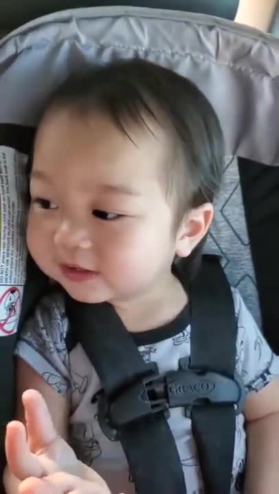 Baby Boy Learning the Art of Blowing Kisses