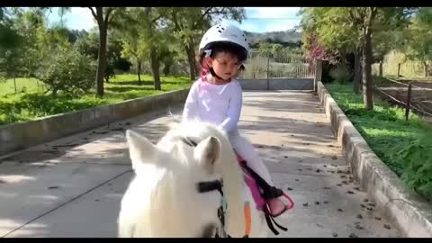 Children riding horses