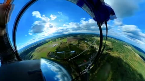 Wingsuiter lands in someone’s back yard