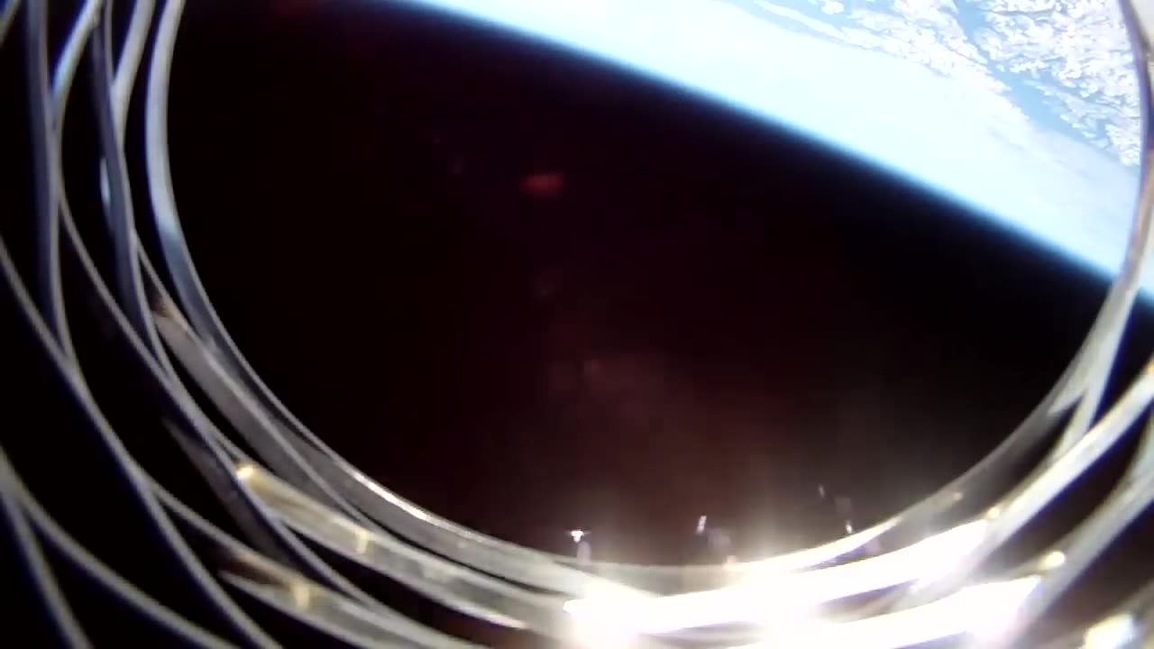 GoPro HD Camera launched into space on high powered rocket. Amazing footage!