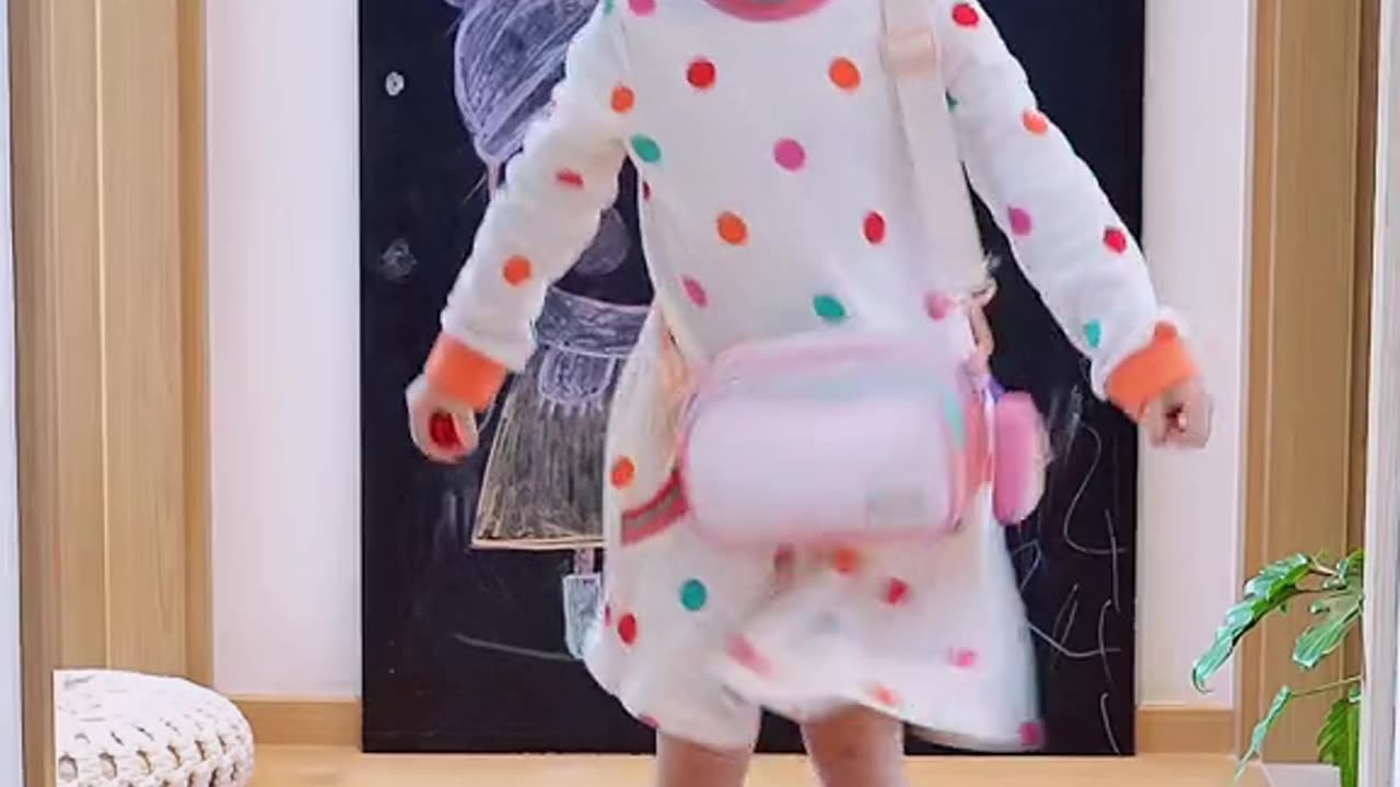 The baby changes clothes in a very cool transformation style