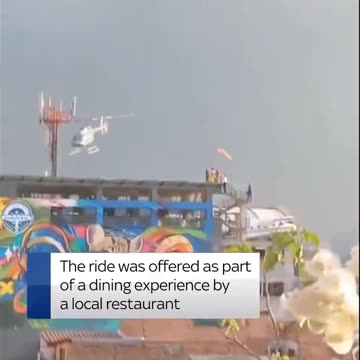 Helicopter crashes in Medellin, Colombia, moments after take-off from a high-rise building