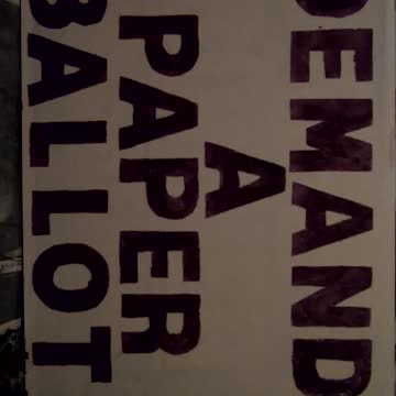 McGiver fraud yard signs