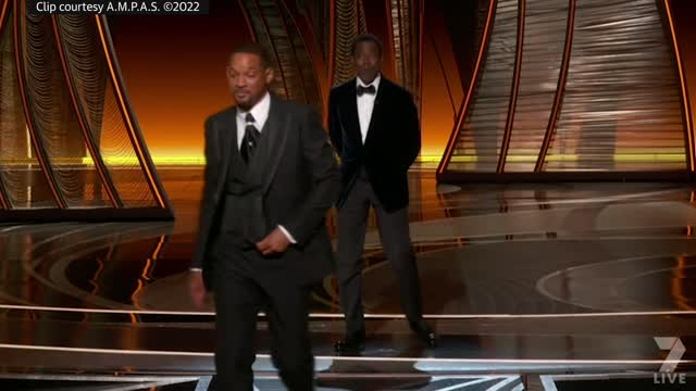 Watch the uncensored moment Will Smith smacks Chris Rock on stage at the Oscars, drops F-bomb