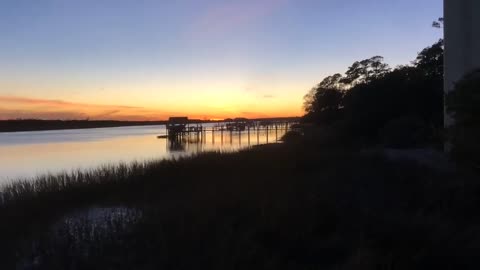 Beautiful Sunset Observed from Shore at Sunset Beach in North Carolina