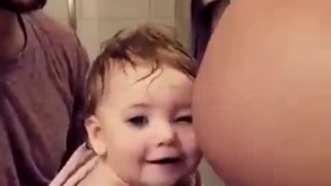 See how this baby loves her little brother!