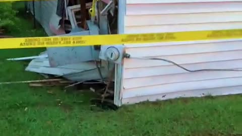 Car Drove Through House