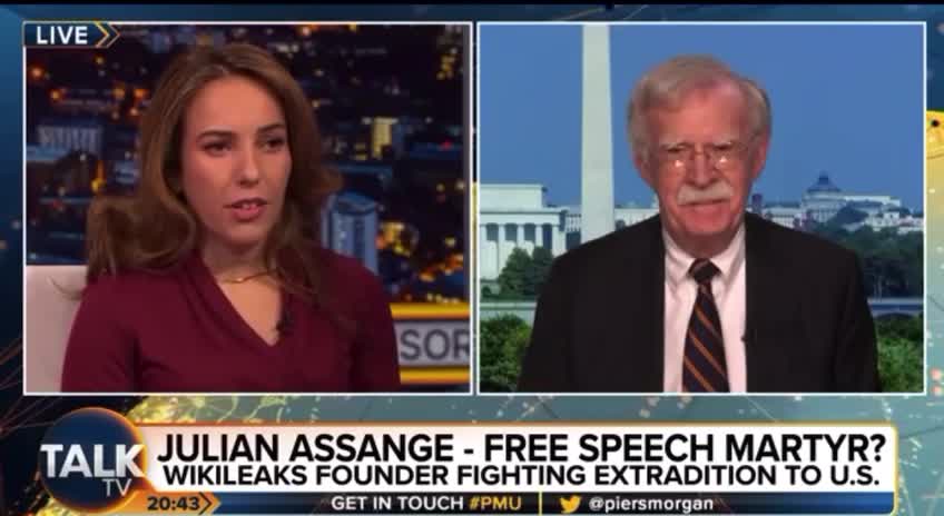 Julian Assange’s Wife Calls Bolton a War Criminal to His Face!