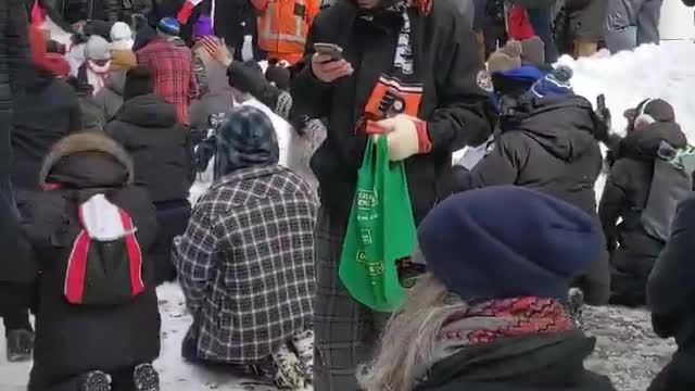 Protesters Kneel in Prayer and Ask for Strength in the Face of Government Tyranny