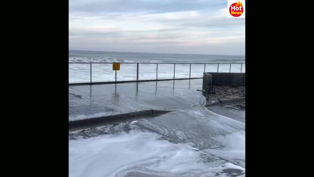 1/16/2022 Large waves crash against the shore of Pacifica