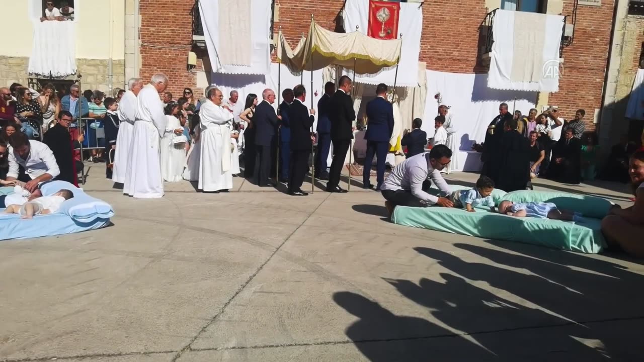 'Devils' jump over babies in Spanish village's unusual festival El Colacho