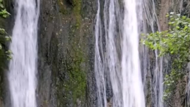 A waterfall hung before my eyes like a silver curtain. What a spectacle!