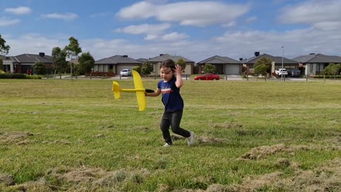 Little Girl Enjoys While Playing With Toy Plane