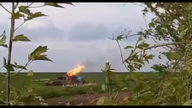 Russian tank cooking off after being hit