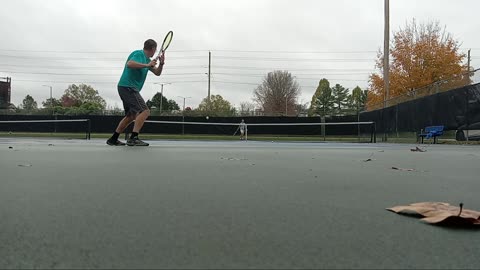 Tennis hitting on a wet court. Forehands/ backhands