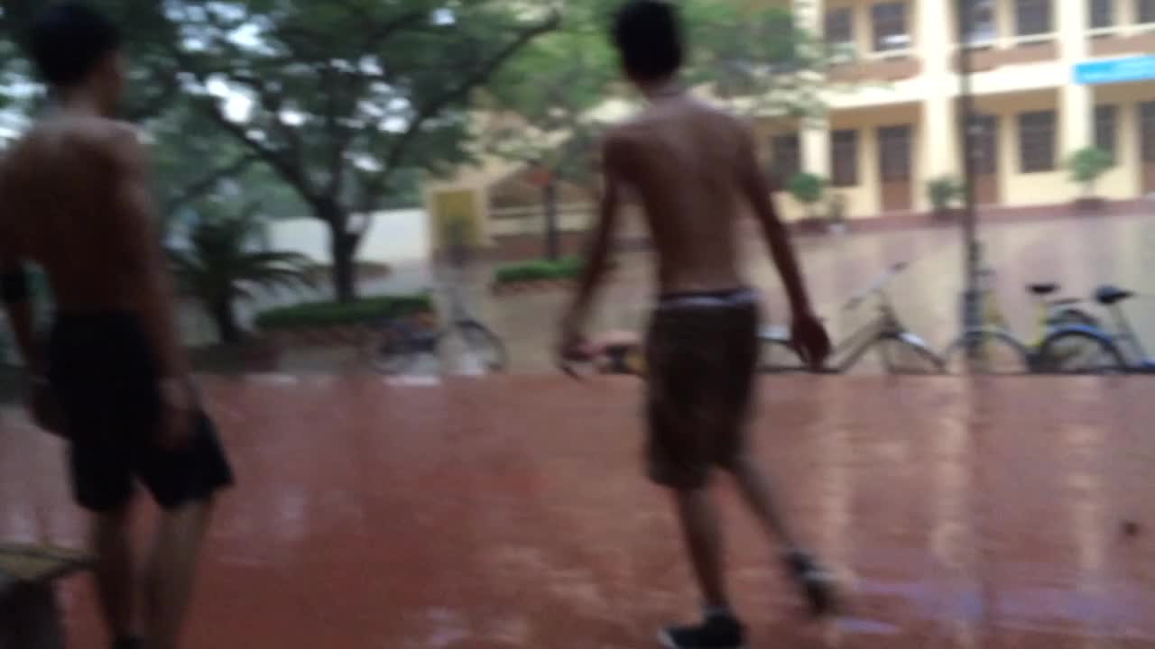 Kids dance in the rain