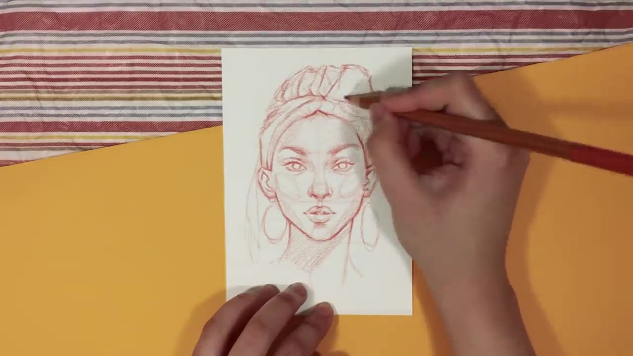 An explanation of how to draw a face, eyes, nose, mouth