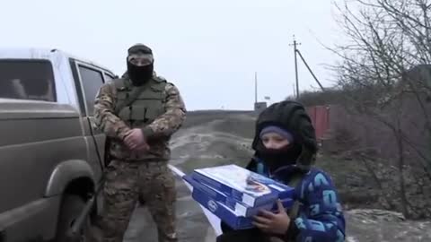 Russian soldiers brings so many presents to Andrey