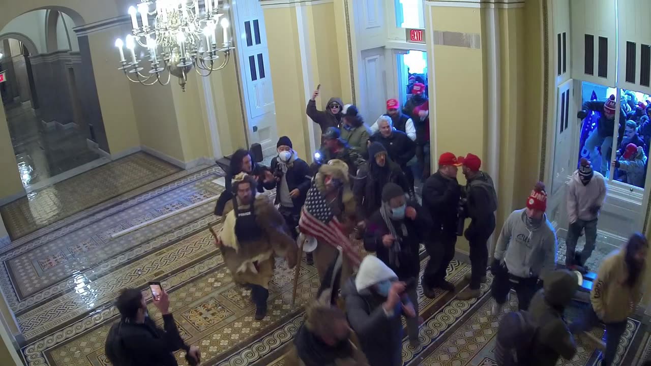 Jacob Chansley Entering Capital Building Door that Others Broke Open Earlier