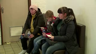 Ukrainian refugees queue to register in Brussels