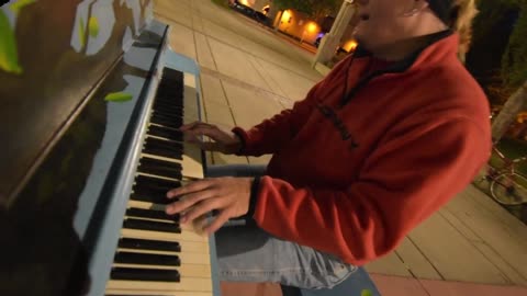 James Elser playing Your Song on a Piano in the Park